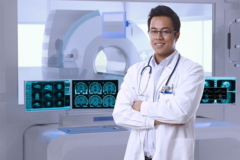 Locum technologist in CT scanner suite